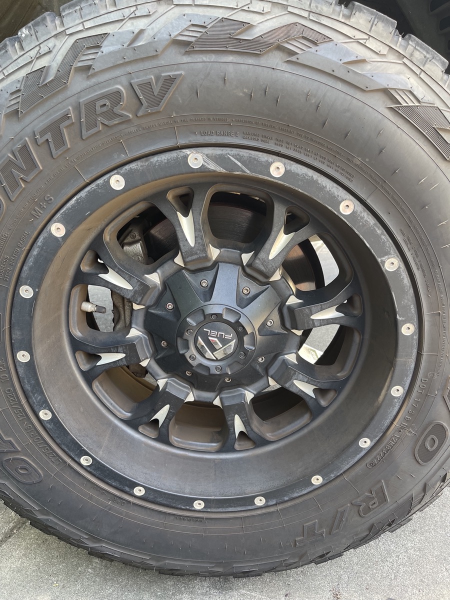Before: 2023 Chevy Silverado Rim Refinishing